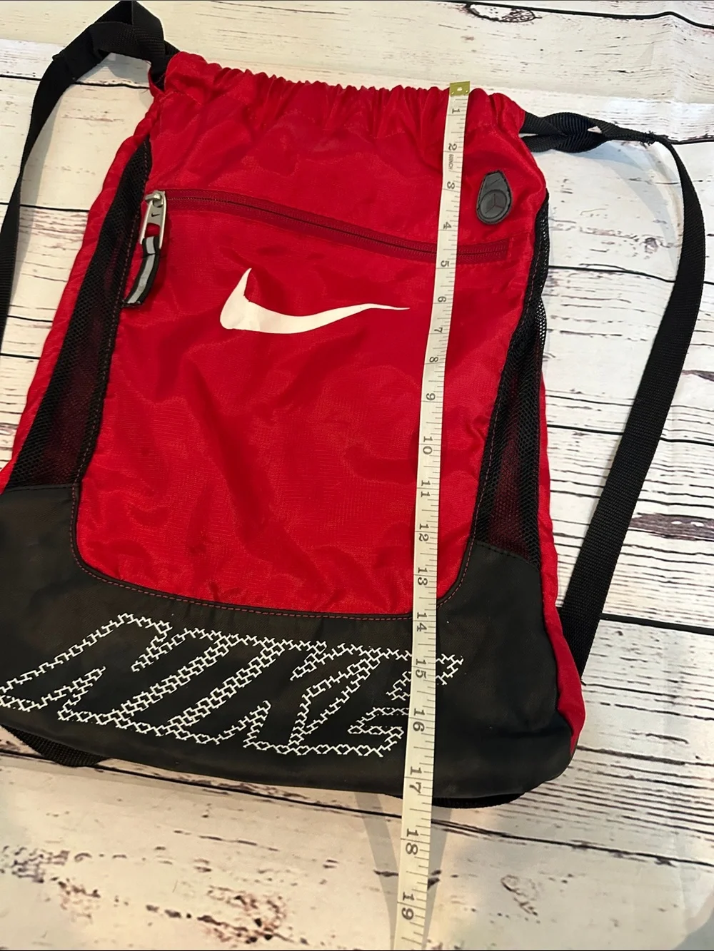 Nike Red and Black Drawstring Backpack with White Swoosh